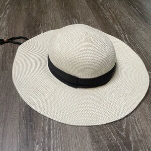 Chic Cream Wide-Brim Hat with Black Band
